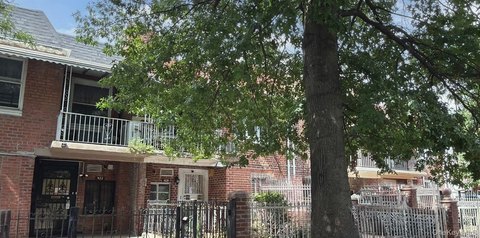 Brick Duplex with Driveway Parking