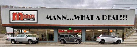 Remodeled Automotive Dealership with Garages