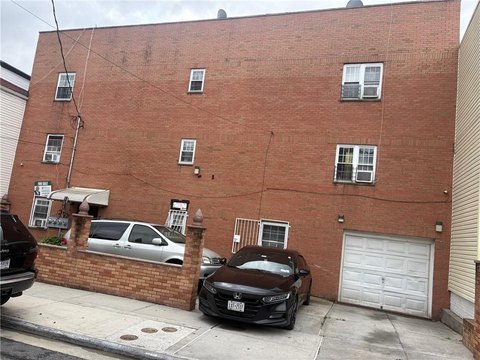 Brick Triplex with Flat Roof