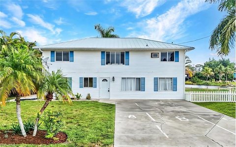 Lakefront Triplex with Renovated Residences