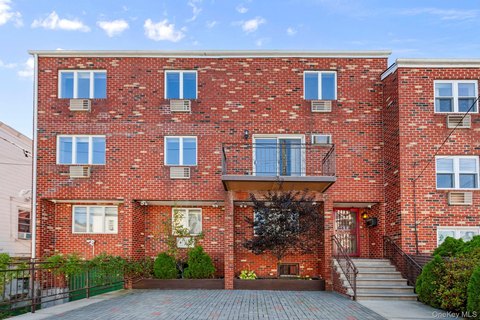 Renovated Two-Family Brick Residence