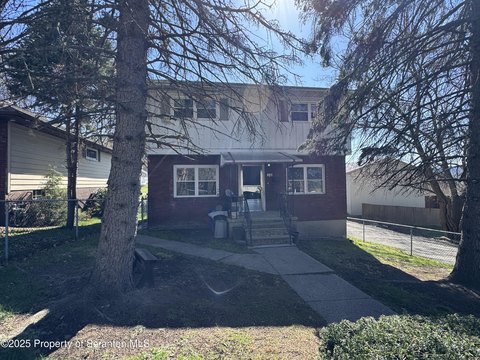 Well-Maintained Duplex with Garage