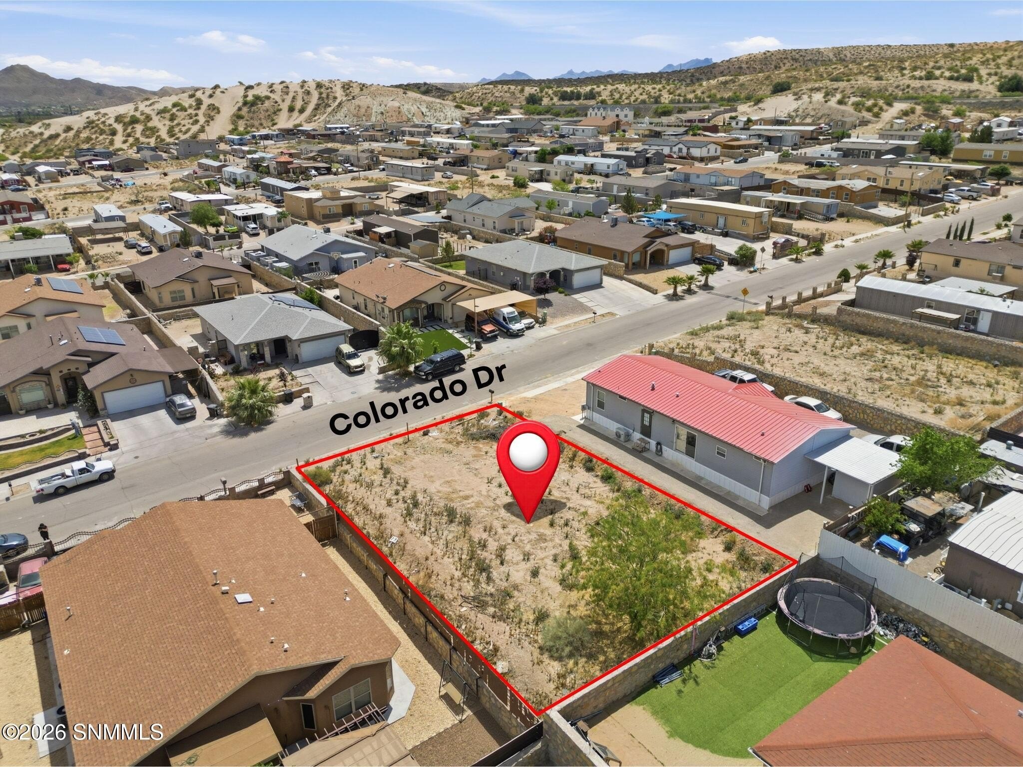Land with Mountain and City Views