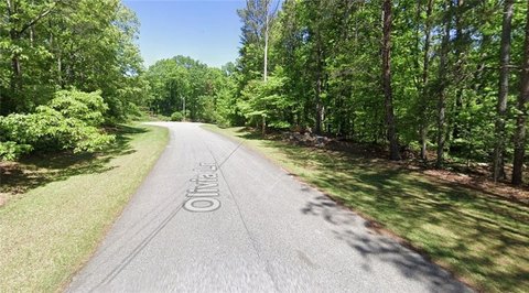 Wooded Acreage Lot with Creek