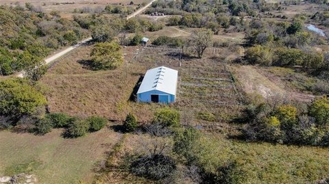 Steel Warehouse on Fenced Land