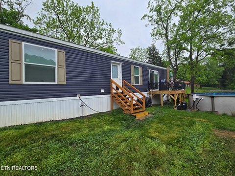 Knoxville Acreage with Upgraded Home