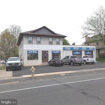 Mixed-Use Garage and Triplex Property
