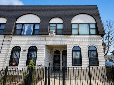 Brick Duplex with Two Garages