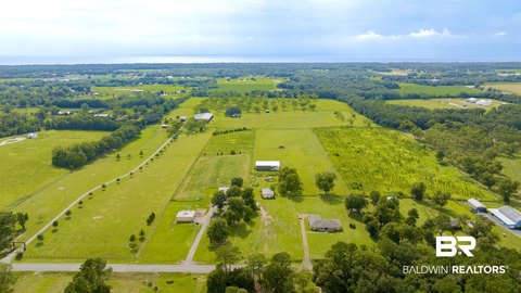 Fairhope Acreage with Rental Income
