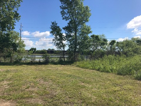 Grand Haven Land with River Frontage