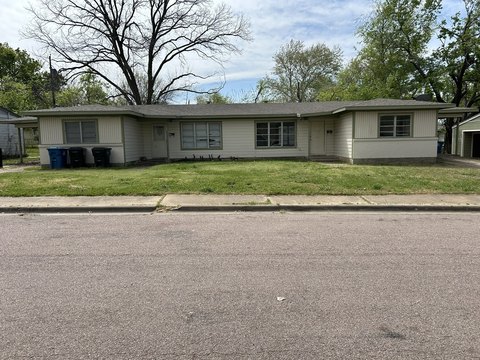 Well-Maintained Duplex with Attached Carports