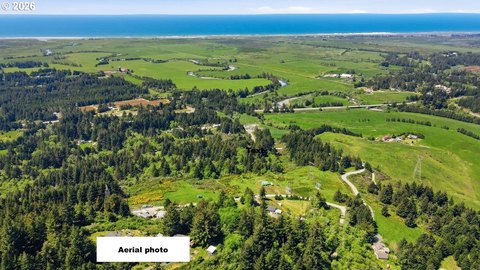 Land with Ocean and Mountain Views