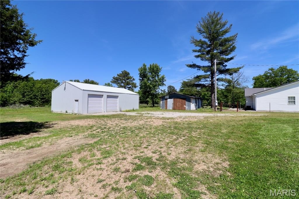 9.69 Acre Property with Outbuildings