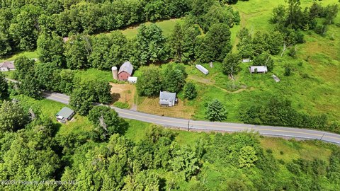 Farmland With Barn and Pond