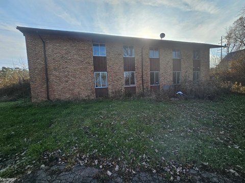 Gutted Commercial Building with Pond Views