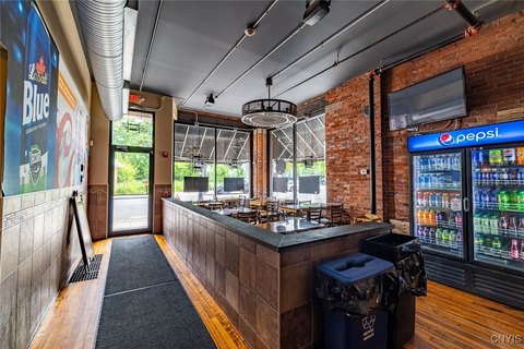 Four-Story Brick Building with Pizzeria