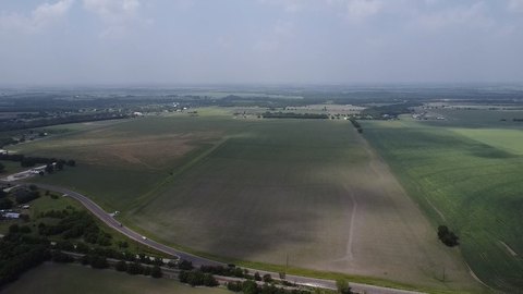 Acreage with Three-Side Road Access