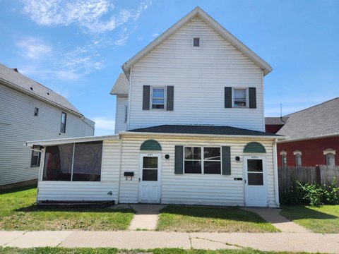 Duplex with Enclosed Porches