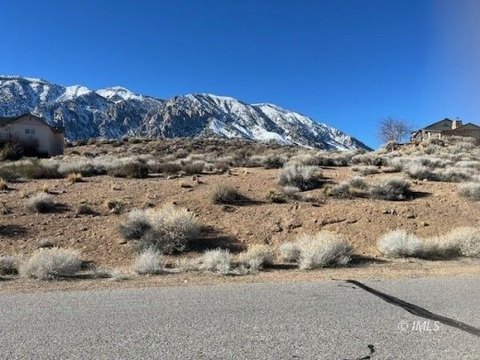 Land with Mountain and Valley Views