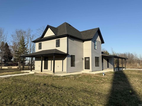 Renovated Duplex with Expansive Acreage