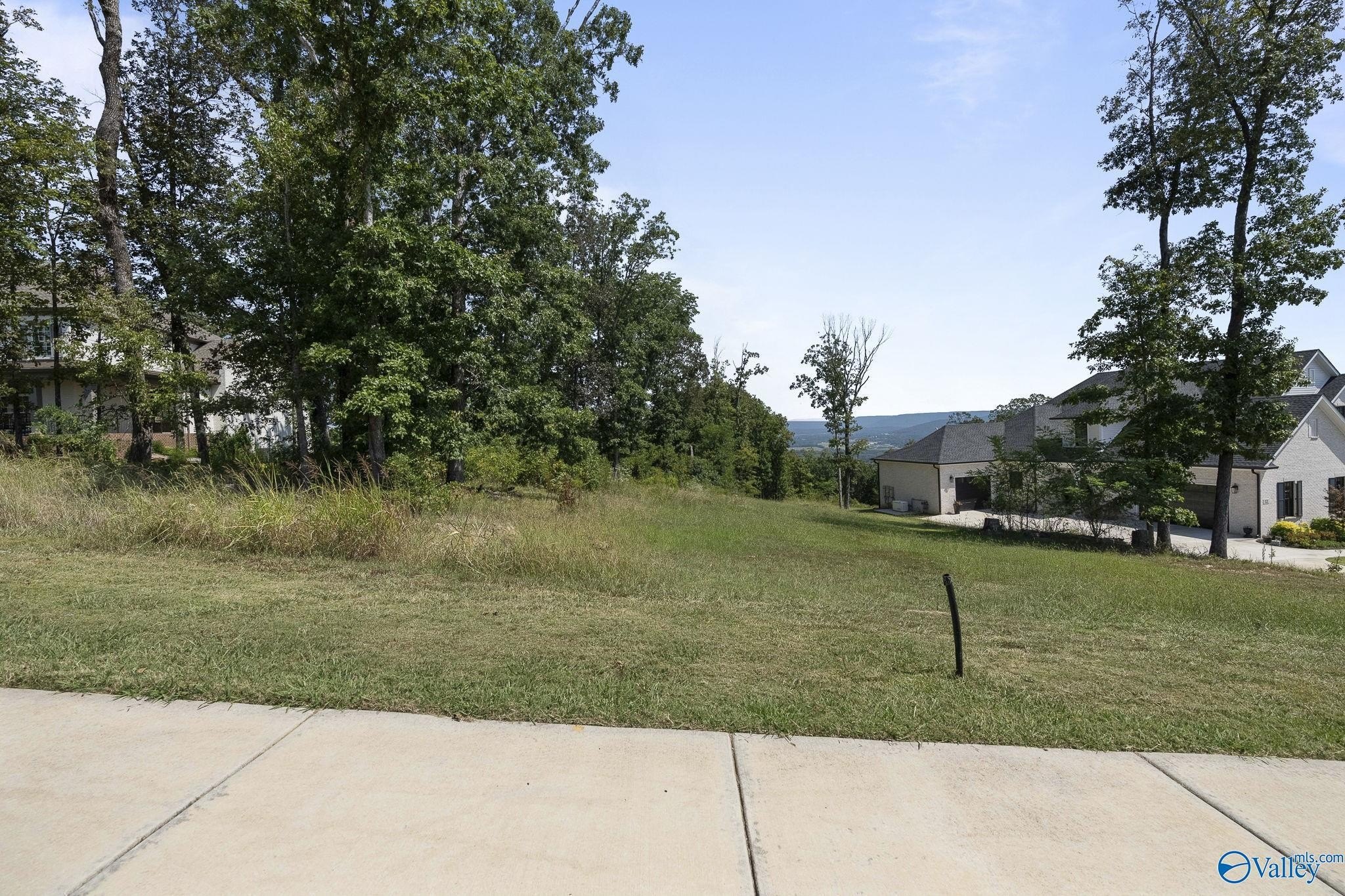 Land with Mountain Crest Views