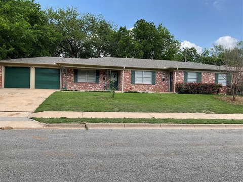 Well-Maintained Duplex with Two Garages