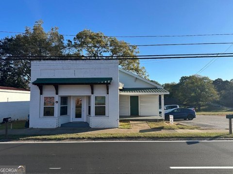 Commerce Mixed-Use Building For Sale