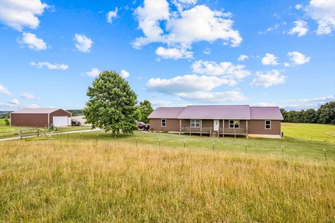 69-Acre Property with Three Homes