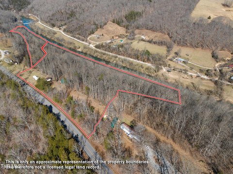 Riverfront Land with Metal Building