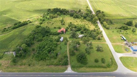 Highway Corner Acreage with Workshop