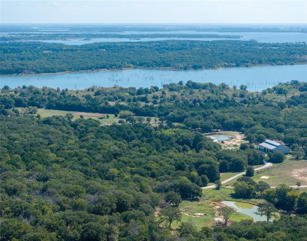 Lakefront Barndominium with Horse Barn
