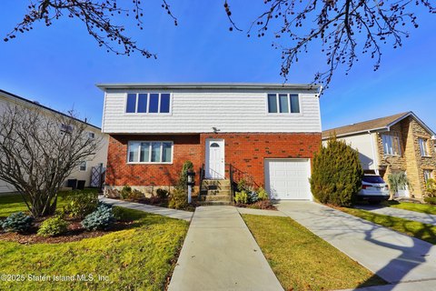 Immaculate Two-Family Home with Garage