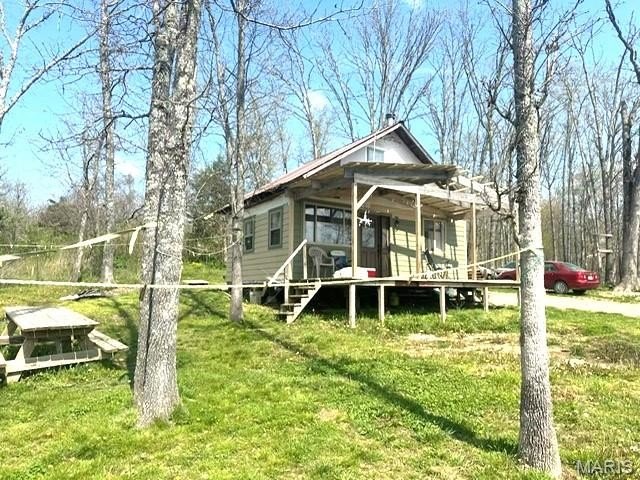 Land with Cabin and Lake