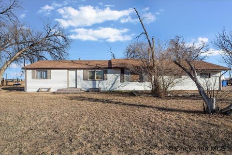 10-Acre Rural Property with Outbuildings