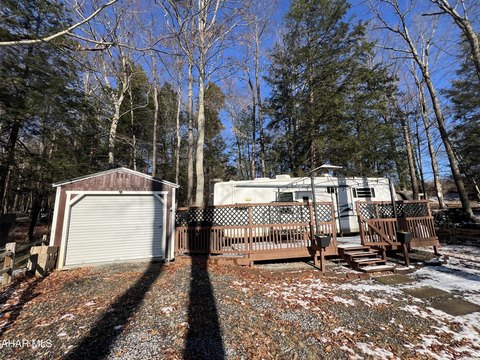 Campsite Lot with Holiday Rambler