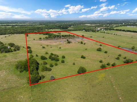 Expansive Ranch Land with Pond
