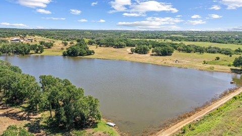 Fenced Ranch Land with Conservation Lake