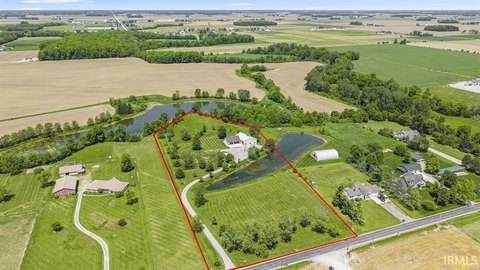 Acreage with Two Ponds and Garages