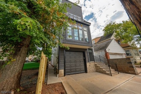 Three-Story Duplex Under Construction