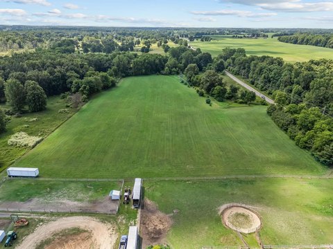 Land Parcel with Pond and Outbuildings