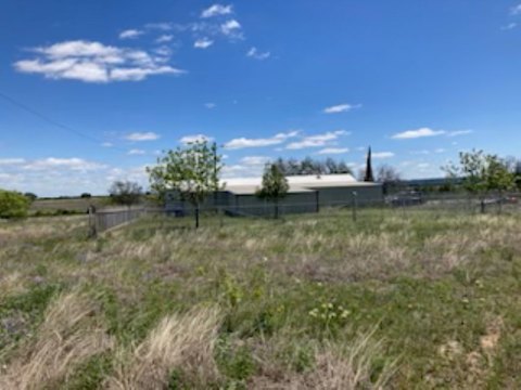 Fenced Industrial Ranch Property