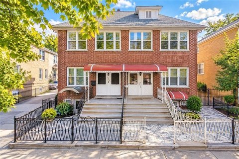 Brick Duplex with Detached Garage