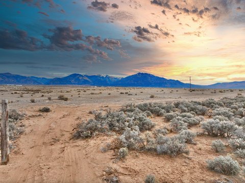 Land with Panoramic Mountain Views