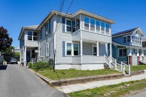 Three-Family Colonial with Solar Panels