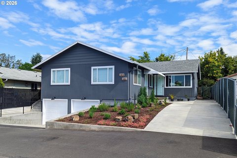 Updated Triplex with Attached Garages