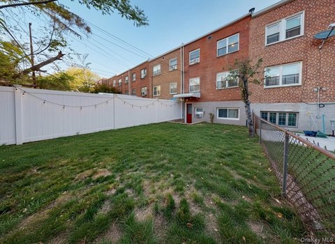 Brick Multifamily Home with Balcony