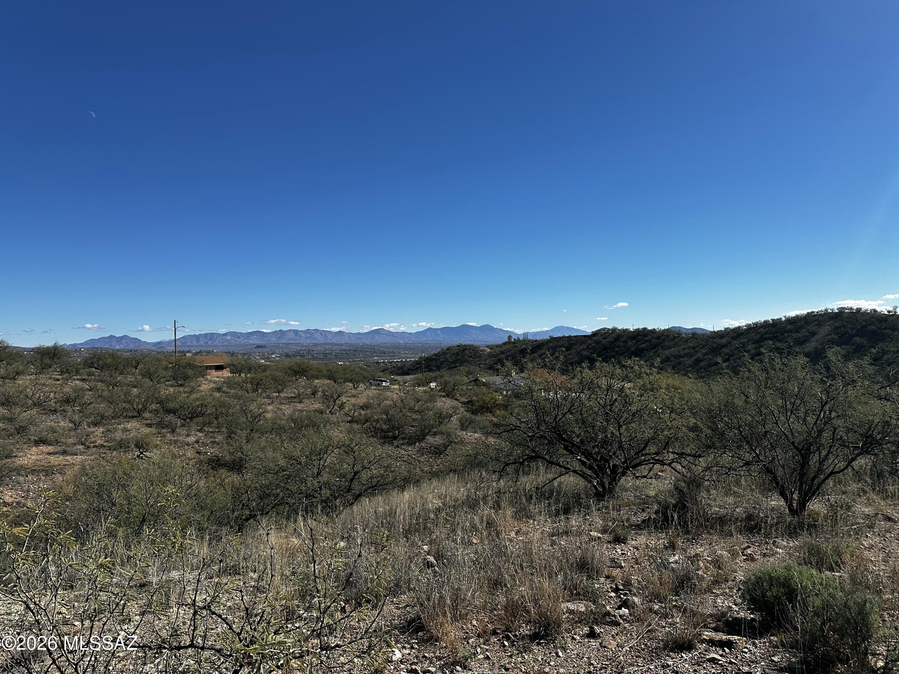 Land with Mountain and Desert Views