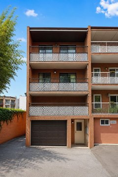 Legal Three-Family Brick Home