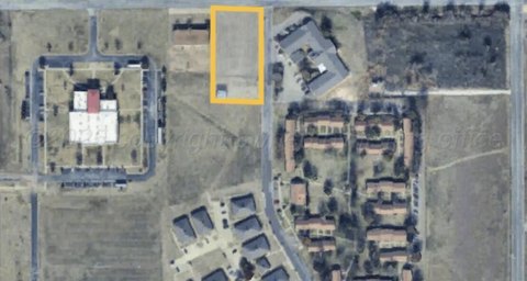 Zoned Commercial Land with Metal Building