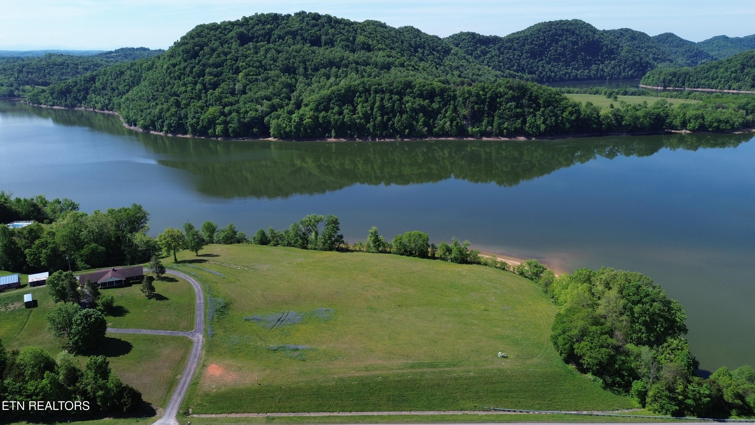 Land with Mountain and Lake Views
